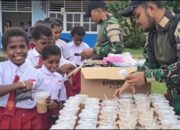 Satgas Yonif 763/SBA Hadirkan Makanan Bergizi untuk Anak-anak SD Inpres Kumurkek