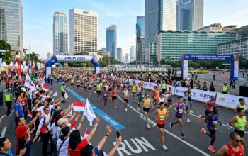 Ribuan pelari melintasi jalur protokol Sudirman-Thamrin dalam ajang BTN Jakarta International Marathon atau JAKIM 2026 setelah 19 jalan utama ditutup total.