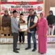 Jajaran Satresnarkoba Polres Purworejo saat membagikan paket sembako bansos bersama anak yatim dán warga di Kutoarjo.