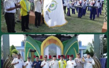 Sekda Ketapang, Repalianto, secara resmi melepas Pawai Ta’aruf yang ditandai dengan pengangkatan bendera