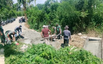 Gotong Royong Tak Kenal Terik, Satgas TMMD Ke-129 Kodim 0102/Pidie Kebut Pembangunan Box Culvert Jalan Pertanian IMG-20260730-WA0010