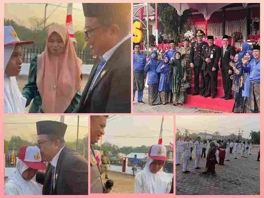 H.M. Bakri saat memberikan apresiasi kepada Nagita Anggraini usai upacara penurunan bendera di Pangkalan Kuras.