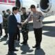 Kapolres Magetan AKBP Raden Erik bersama Forkopimda menyambut kedatangan Wapres Gibran di Lanud Iswahjudi.