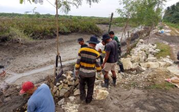Menembus Batas Akhir Pekan, Satgas TMMD Kodim Asahan Pacu Rampungkan Turap Desa Kapal Merah FB_IMG_1785571540790