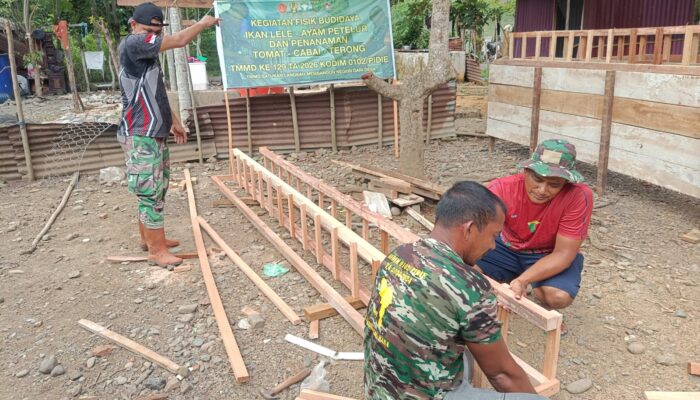 Inovasi Gemilang TMMD Ke-129 Kodim 0102/Pidie: Budidaya Terpadu Kandang Ayam dan Kolam Lele Siap Genjot Ekonomi Warga