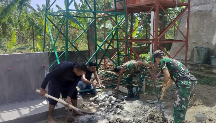 Pengecoran Tiang Tandon Air TMMD ke-129 di Blang Cot Dikebut Satgas dan Warga
