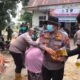 Saat Kerumutan Diselimuti Asap, Kapolres Pelalawan Turun Langsung: Warga Diberi Masker, Sembako hingga Layanan Kesehatan