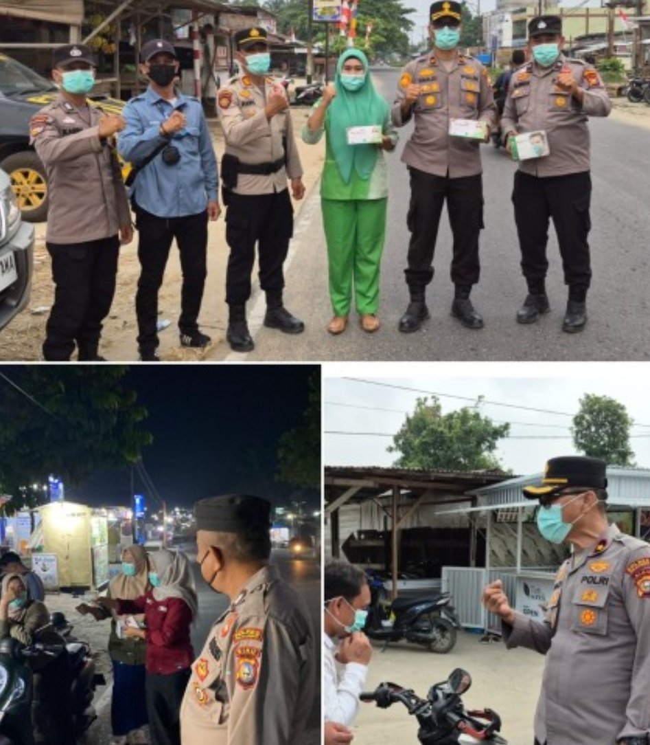 Kapolsek Pangkalan Kuras Kompol Rinaldy Parlindungan bersama tenaga medis RS Medicare membagikan masker gratis kepada pengendara.