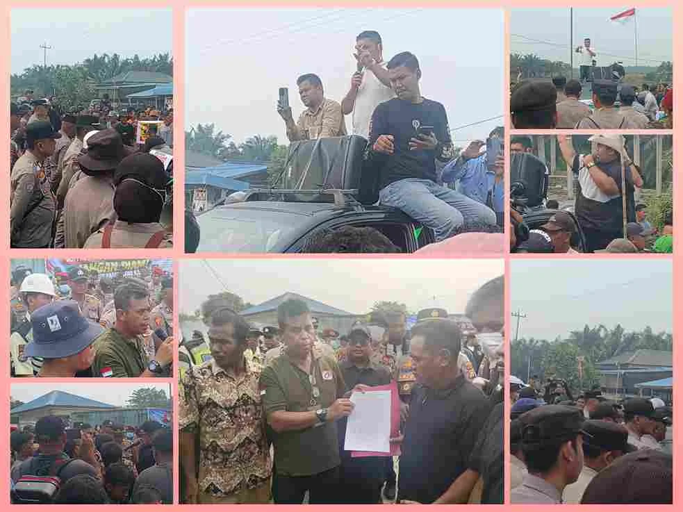 Ratusan warga yang tergabung dalam Aliansi Nelayan Peduli Sungai Kerumutan saat menggelar aksi unjuk rasa di depan PT KPT.