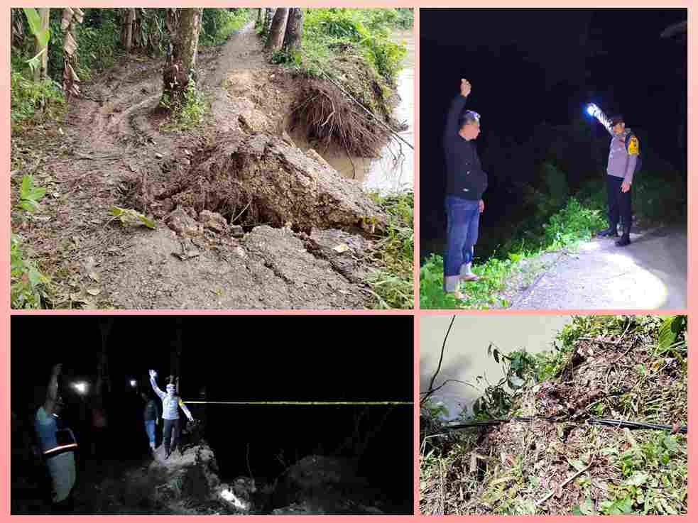 Petugas kepolisian memasang garis polisi di lokasi longsor dan tiang listrik roboh di Gunungsitoli.