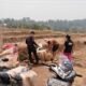 Warga Kampung Rawey, Desa Sukasirna, Jonggol, membangun saluran pipa air swadaya.