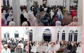 Wakil Bupati Pelalawan Husni Tamrin saat menyerahkan sedekah dan berinteraksi dengan jamaah di Masjid Roisyam.